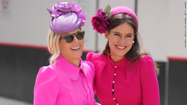 Princess Anne's daughter Zara Tindall and Lady Frederick Windsor looked giddy in pink dresses and ornate fascinators.