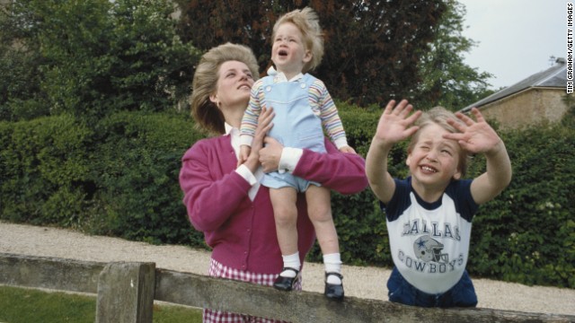 Princes William and Harry with their mother, Diana, in the garden of Highgrove House in Gloucestershire, 18th July 1986.