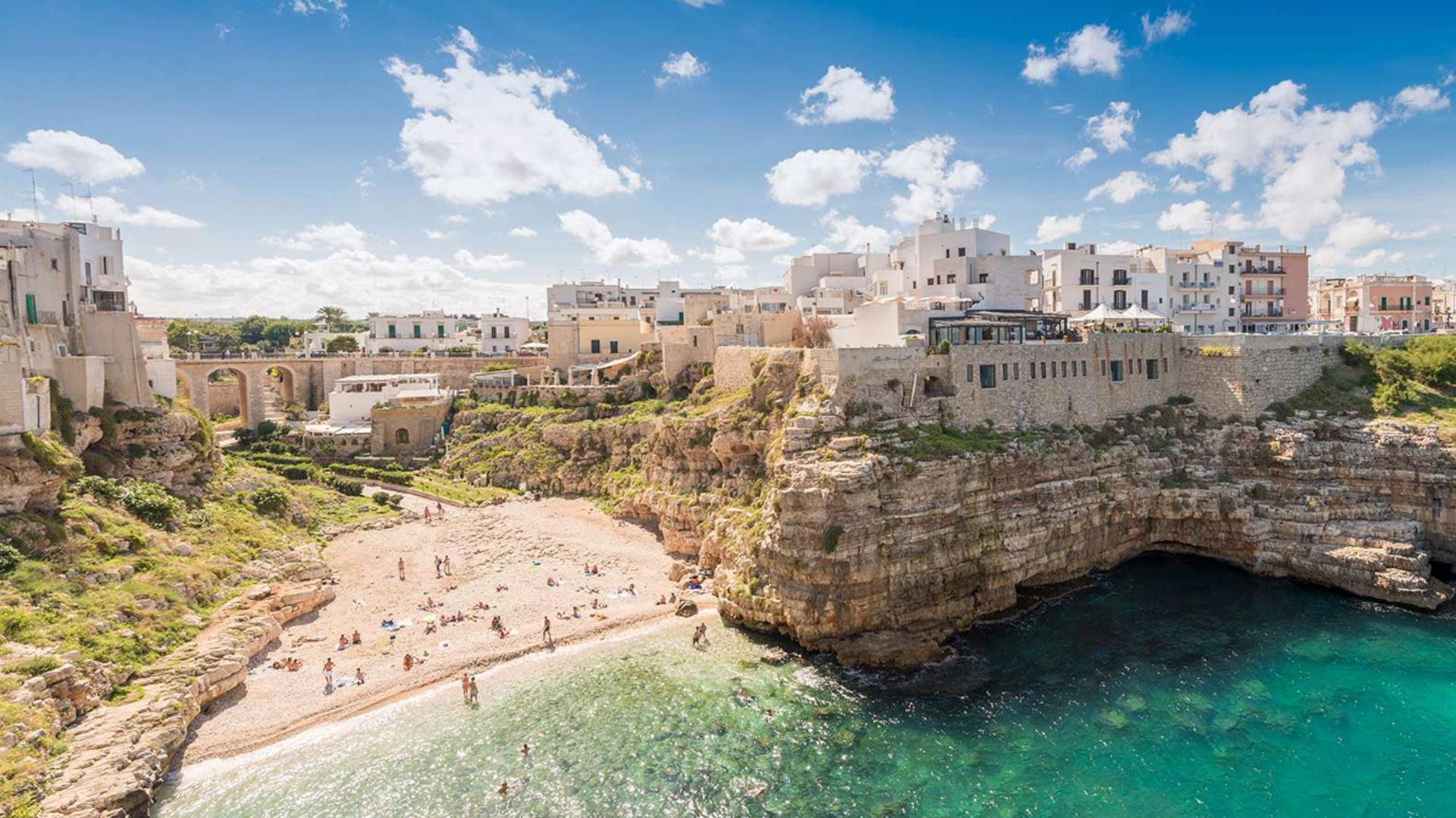 Polignano a Mare is a fjord-like cove surrounded by cliffs.