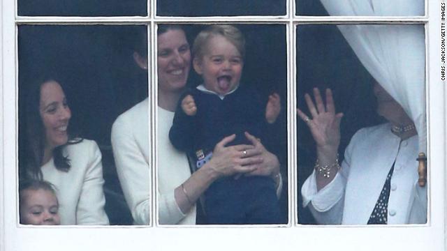 Prince George is held by his nanny, Maria Teresa Turrion Borrallo, during the Trooping the Colour ceremony in June 2015.