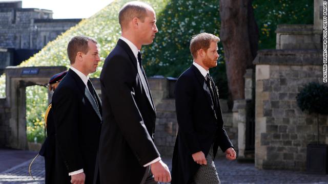 From left, Philip's grandsons Peter Phillips, Prince William and Prince Harry take part in the funeral procession.