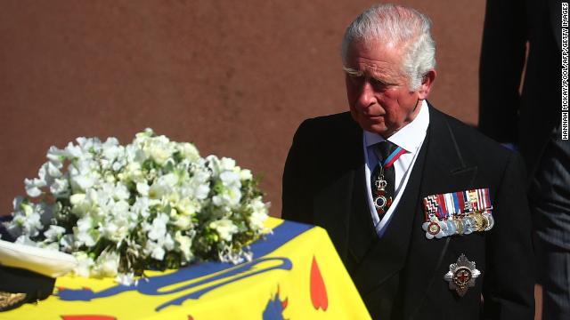 Prince Charles walks behind his father's coffin. 