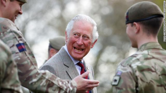 Prince Charles shares a joke with Welsh Guardsmen during an tour of their Windsor barracks this week.