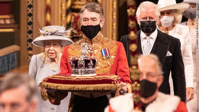 The Queen follows the Imperial State Crown along the royal gallery during the State Opening of Parliament at the House of Lords on Tuesday.