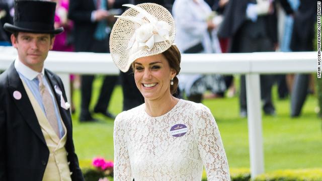 Princess Anne wore a deep blue ensemble with a bespoke face covering on the first day of Royal Ascot. 