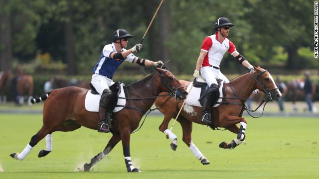 William and Harry compete in a charity polo event in 2019. 