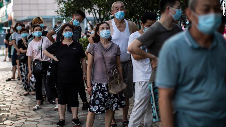 Residents line up for coronavirus testing on August 3 in Wuhan, China.