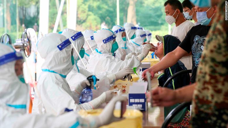 Residents line up at a Covid-19 testing center in Yangzhou, Jiangsu, China, on August 11.