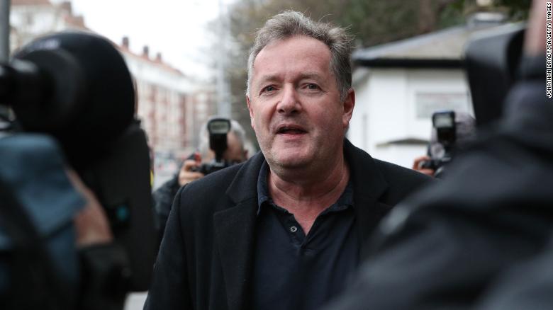 Piers Morgan speaks to reporters outside his home in Kensington, central London, the morning after it was announced by broadcaster ITV that he was leaving as a host of Good Morning Britain.