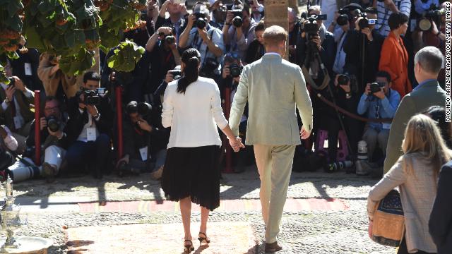 The Sussexes walk towards the media outlets traveling with them during their Morocco visit in 2019. 