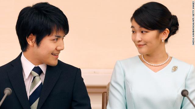 Princess Mako and her fiancee Kei Komuro during a press conference to announce their engagement at the Akasaka East Residence in Tokyo on September 3, 2017.