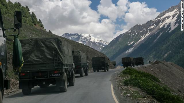 An Indian army convoy travels towards Leh through Zoji La, a high mountain pass bordering China, on June 13 in Ladakh, India.