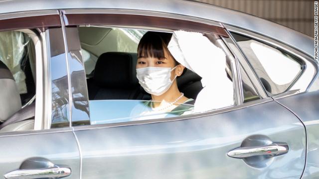 Princess Mako arrives for a press conference with her new husband Kei Komuro on Tuesday. 