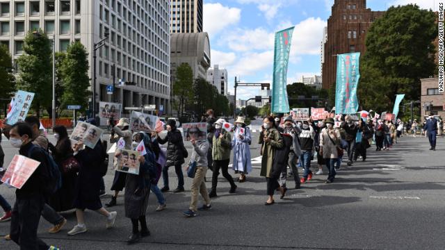 People took part in a march protesting the wedding on Tuesday.