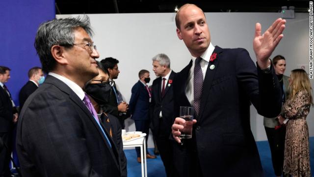 The Duke of Cambridge speaks with Japan’s Vice-Minister for Global Environmental Affairs, Yutaka Shoda, on the sidelines of the conference on Tuesday.