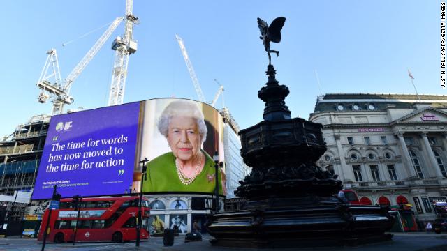 A photo of a quote from the Queen's COP26 video message, displayed at Piccadilly Circus in London on Wednesday.