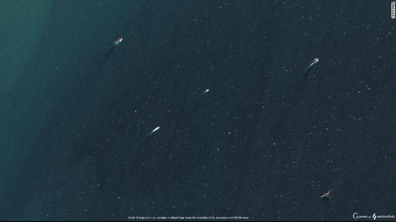 An image from European satellite imaging company Sentinel 2 shows what analyst HI Sutton says is a Chinese submarine in the lower left.