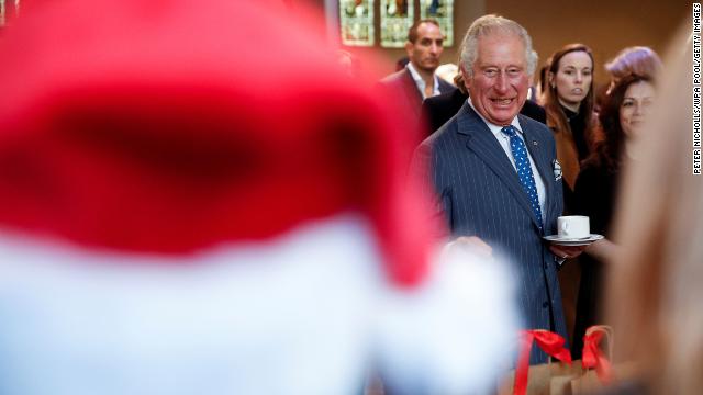 Prince Charles looks on gleefully while attending an advent service at Holy Trinity Brompton church on Thursday in London. 