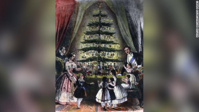 December 1848:  The Royal Christmas tree is admired by Queen Victoria, Prince Albert and their children. 