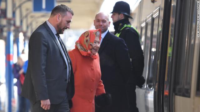 The Queen boards a train at King's Lynn railway station in Norfolk, as she returns to London after spending the Christmas period at Sandringham House.