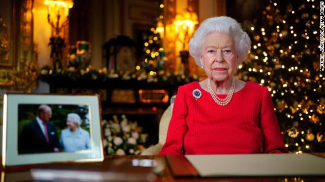 Britain's Queen Elizabeth paid tribute to the late Prince Philip during her first Christmas television broadcast since the death of her husband of 73 years.