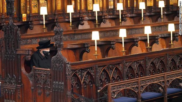 Queen Elizabeth II takes her seat during the funeral of Prince Philip.