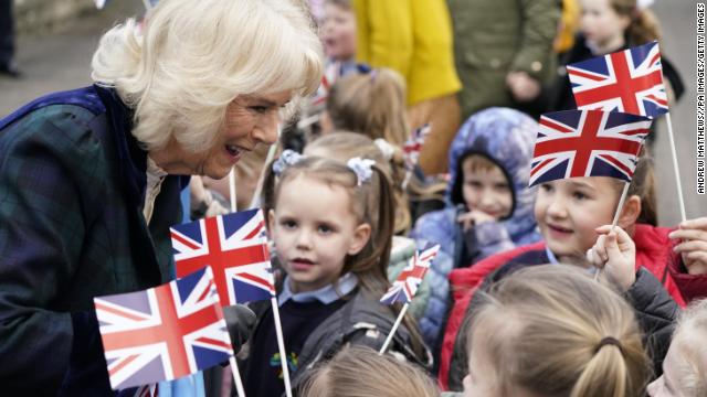 The Duchess of Cornwall meet children as she arrives for a visit to Roundhill Primary School, in, Southdown, Bath.