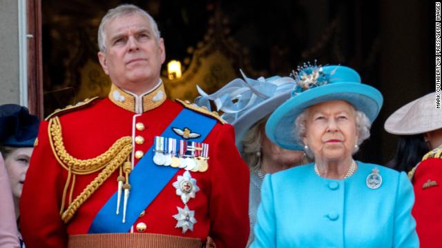 Mother and son watch the Trooping The Colour parade in 2018.