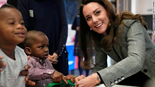 Catherine plays with children during a cooking workshop at PACT (Parents and Children Together) in London on February 8. 