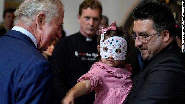 Charles meets refugees during the visit on Wednesday. 