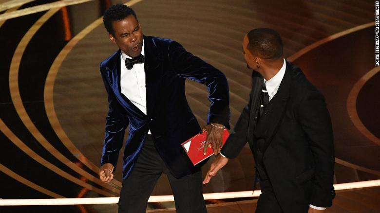 Will Smith slaps Chris Rock during the 94th Academy Awards show.