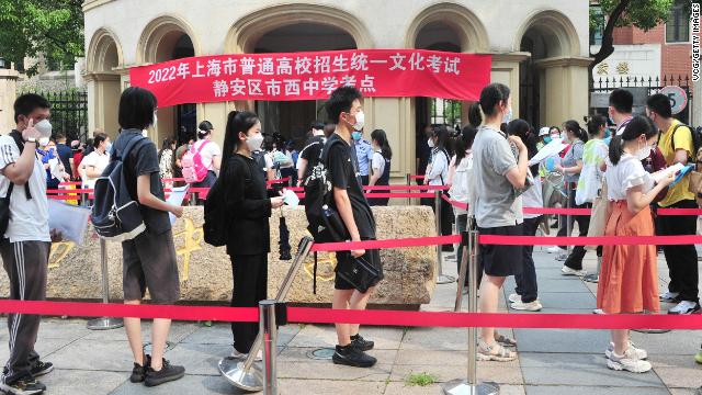 Students wait to sit college entrance exams in Shanghai.