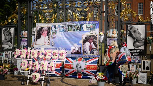 Messages and photographs of Diana, Princess of Wales are seen on the gate of Kensington Palace.