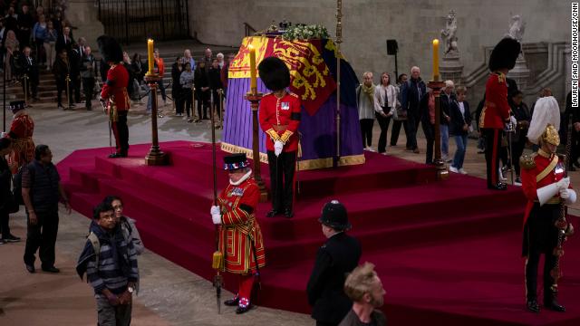 The public walks past the Queen's coffin in Westminster Hall.