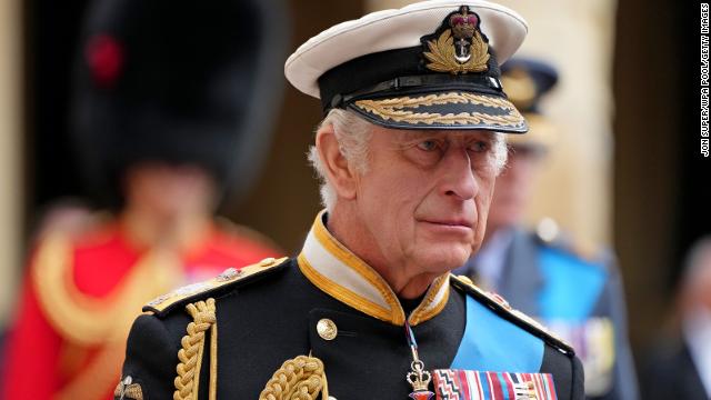 King Charles III follows the hearse with the coffin of Queen Elizabeth II moving towards St. George's Chapel at Windsor Castle on Monday. 