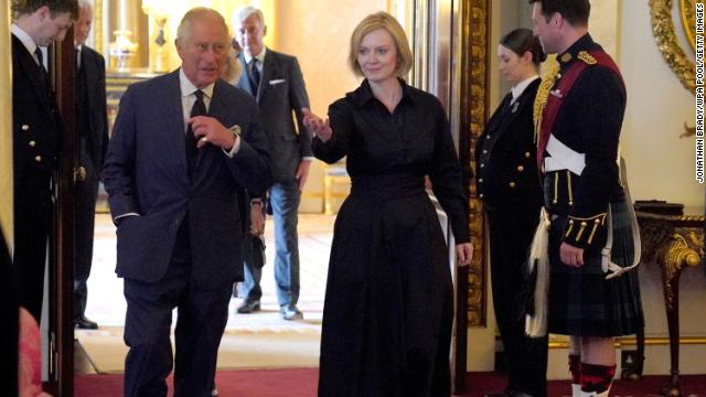 The King walks with Prime Minister Liz Truss and members of her Cabinet in the 1844 Room, at Buckingham Palace on September 10. 