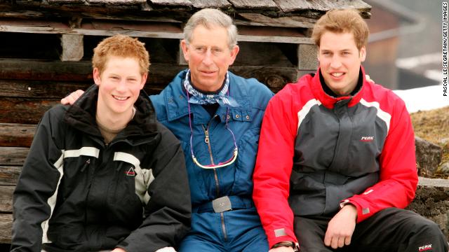 File photograph from 2005 of then-Prince Charles posing with his sons, Princes William and Harry during a ski break in Switzerland.