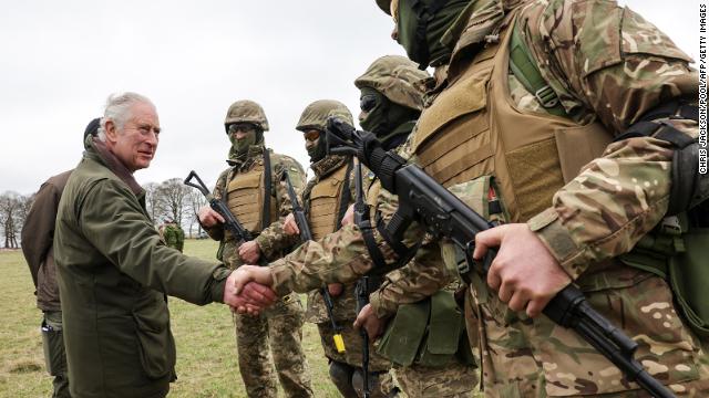 King Charles greets Ukrainian military recruits.