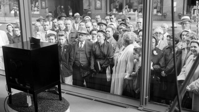 New Yorkers watching the Coronation of Queen Elizabeth II on a display television in 1953.