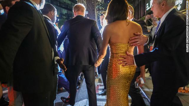 Prince Harry and Meghan depart the awards. 