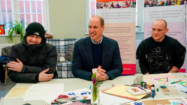 Prince William, Prince of Wales sits with with residents Gary and Marc as he visits The Passage and officially opens two residential buildings, Bentley House and Passage House on February 23, 2023 in London, England.