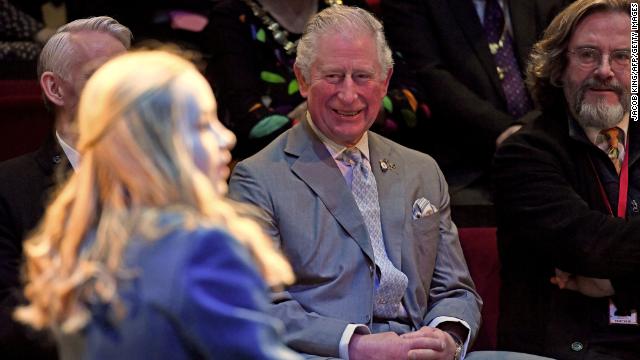 File photograph of Charles watching a performance of ''The Boy in the Dress'' during a visit to the Costume Workshop of the Royal Shakespeare Company in 2020.