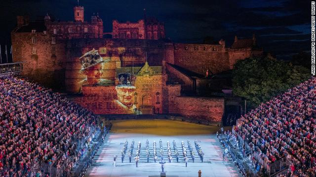 Projections of the late Queen and King Charles III are set against the stunning backdrop of Edinburgh Castle at this year’s Royal Edinburgh Military Tattoo – an annual spectacle that sees international teams perform incredible military drills, music and dancing.