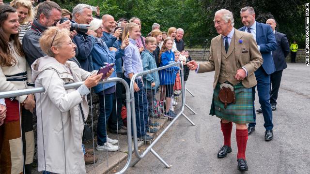 King Charles III greets members of the public at the gates of Balmoral in August. 