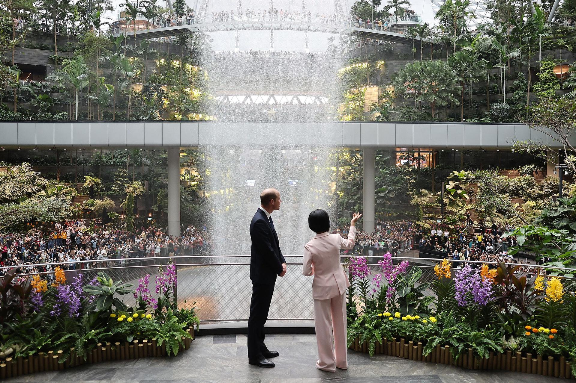 Prince William views the HSBC Rain Vortex, an incredible 40-meter-tall (around 130 feet) indoor waterfall, at Jewel Changi Airport shortly after his arrival in Singapore on Sunday. 