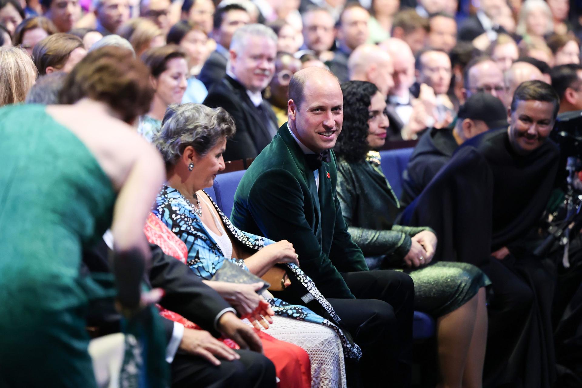 Prince William shows off his green credentials, dressing sustainably by reusing a green velvet blazer that he previously wore at the inaugural Earthshot Prize awards ceremony in London in 2021.