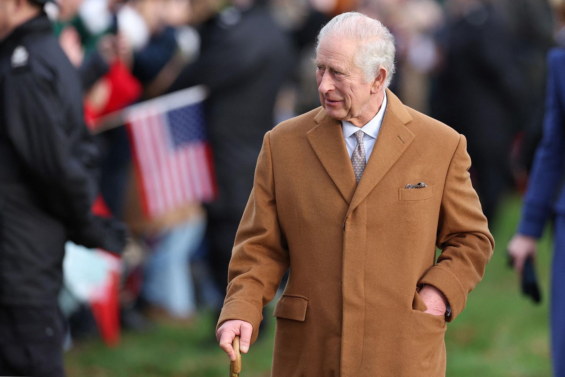 Britain's King Charles III arrives for the royal family's traditional Christmas Day service at St. Mary Magdalene Church on the Sandringham Estate in eastern England, on December 25.