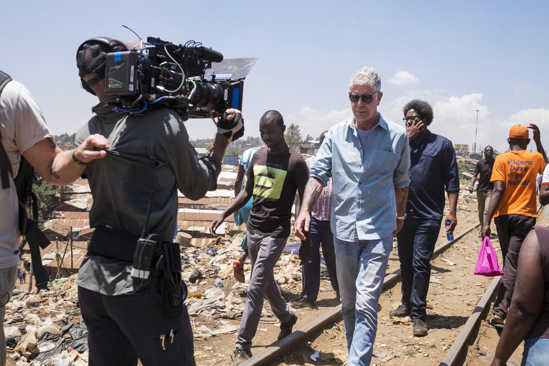 Anthony Bourdain with W. Kamau Bell in the Kibera slums in Nairobi, Kenya in 2018. 