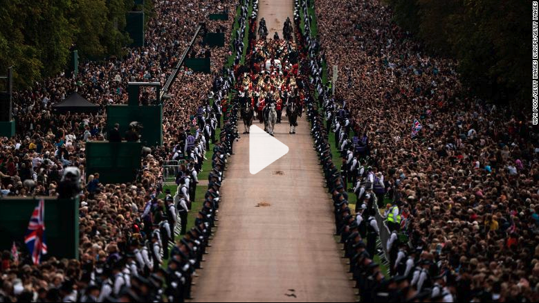 CNN speaks to people in the crowd at the Queen's funeral.