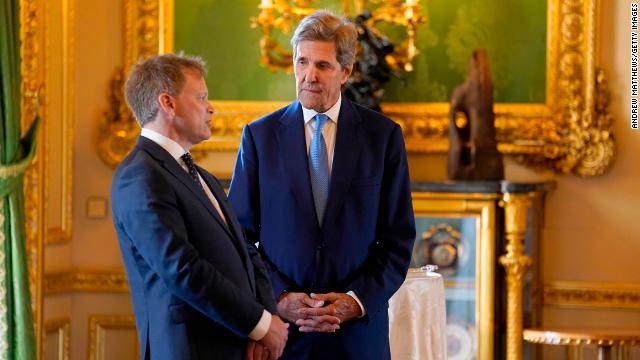 Secretary of State for Energy Security Grant Shapps, left, and United States Special Presidential Envoy for Climate John Kerry chat in the castle's Green Drawing Room.